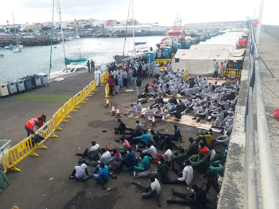 MIgrantes en Muelle